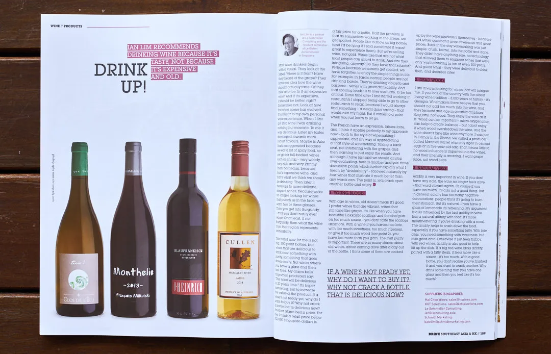Wine bottles on white background with translucent ruby backlighting — Drink Magazine wine product photography