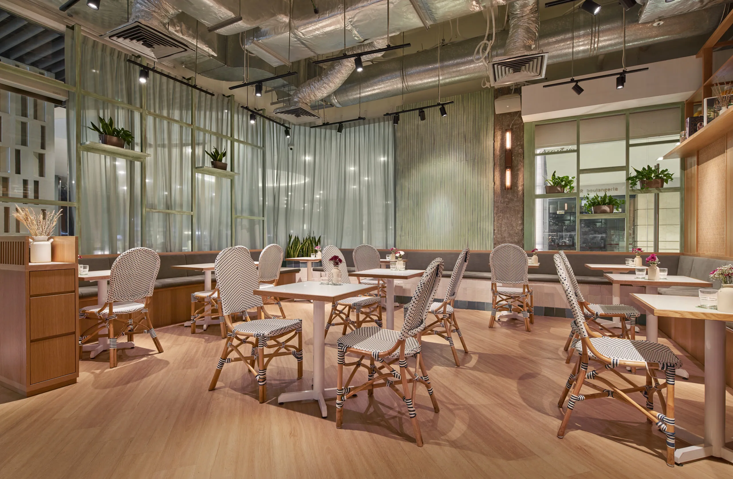Spacious dining area with natural light and modern decor – restaurant interior design photography at Little Farms Valley Point