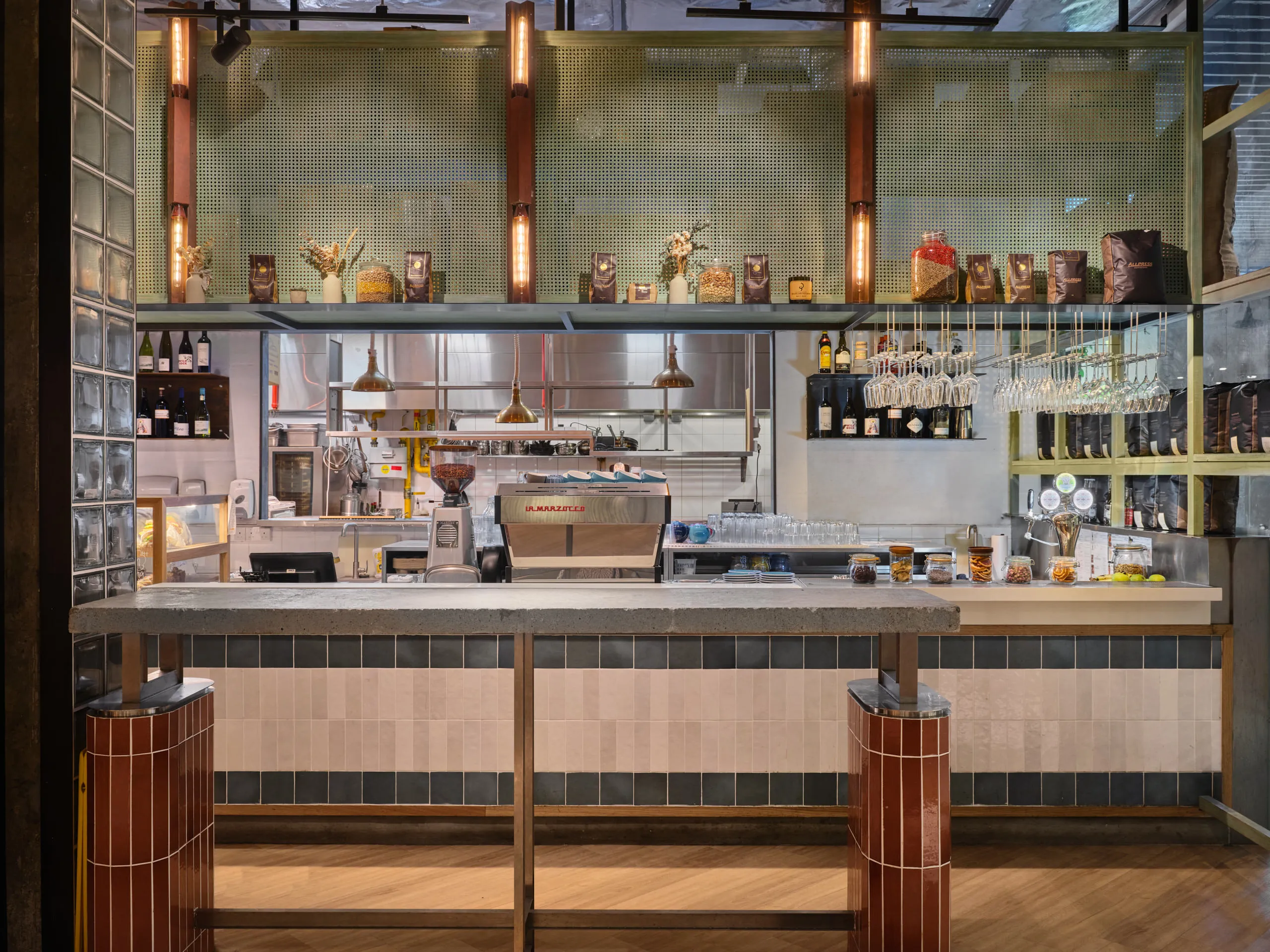 Front counter with coffee bar and open shelves – restaurant interior design photography at Little Farms Valley Point
