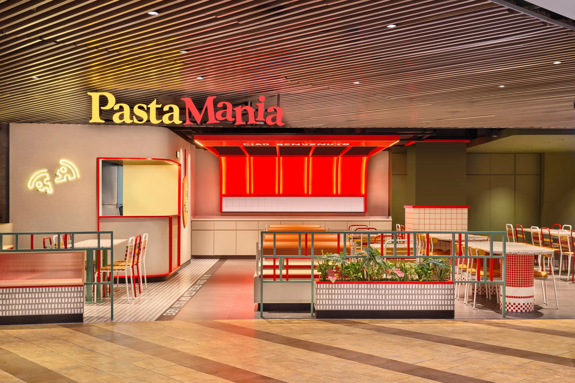 Storefront with red Ciao Benvenuto canopy and mint railings — PastaMania Causeway Point restaurant photography