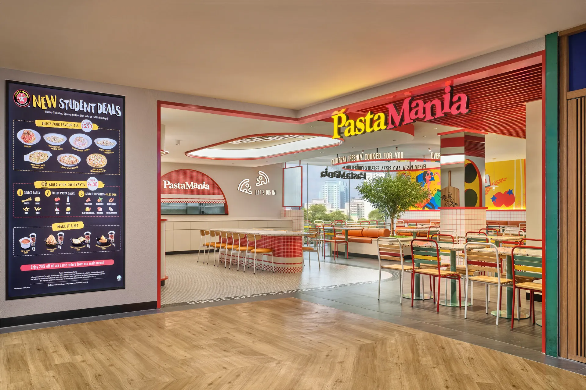 Mall storefront entrance with red signage, digital menu and olive tree interior — PastaMania Northpoint restaurant photography