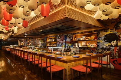 Yankii Robatayaki & Bar Bangkok bar counter and sake display