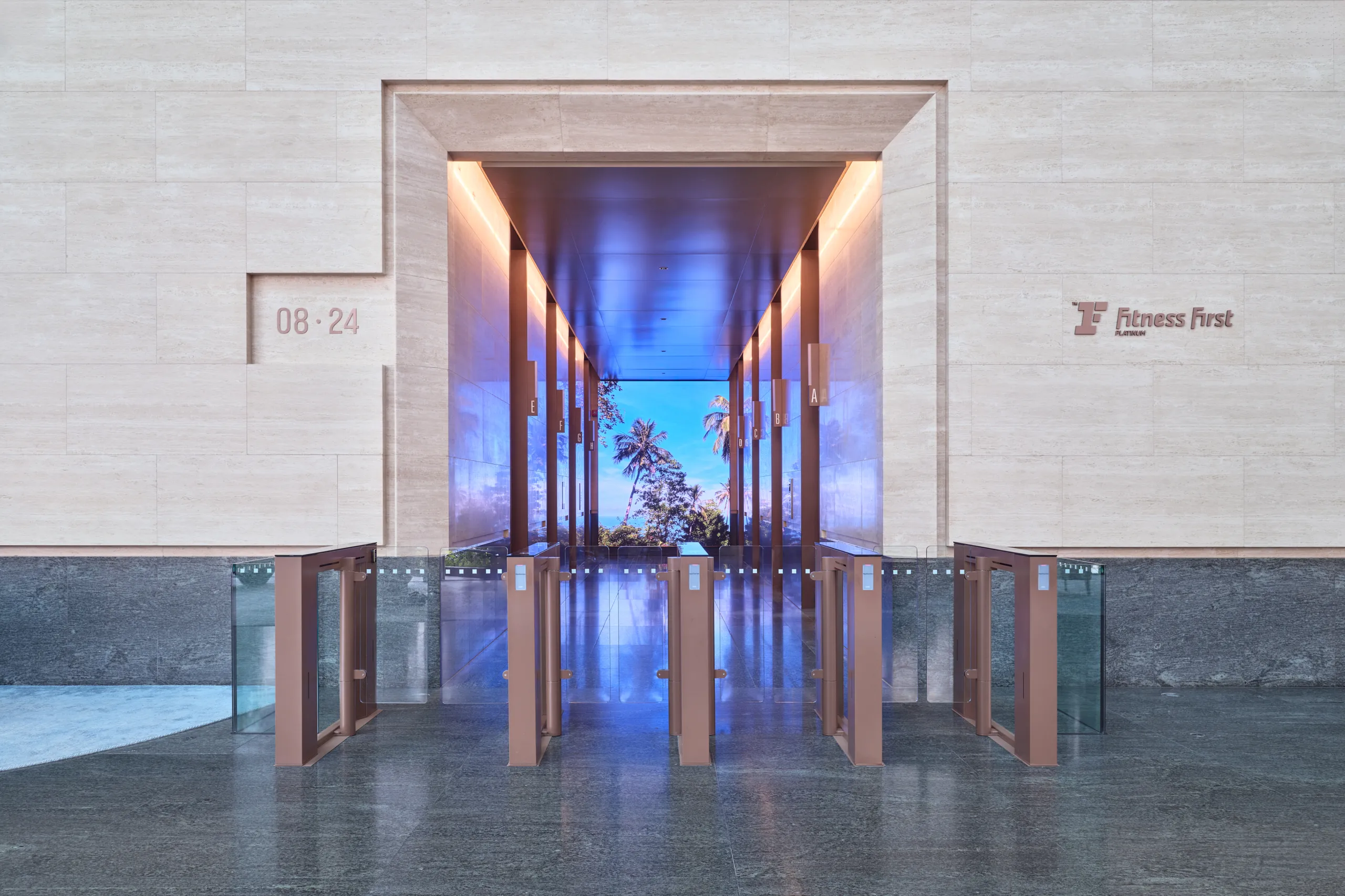 One Raffles Quay North Tower lift lobby with blue lighting at entrance. Architectural photography for Gensler by Christopher O’Grady, Singapore.