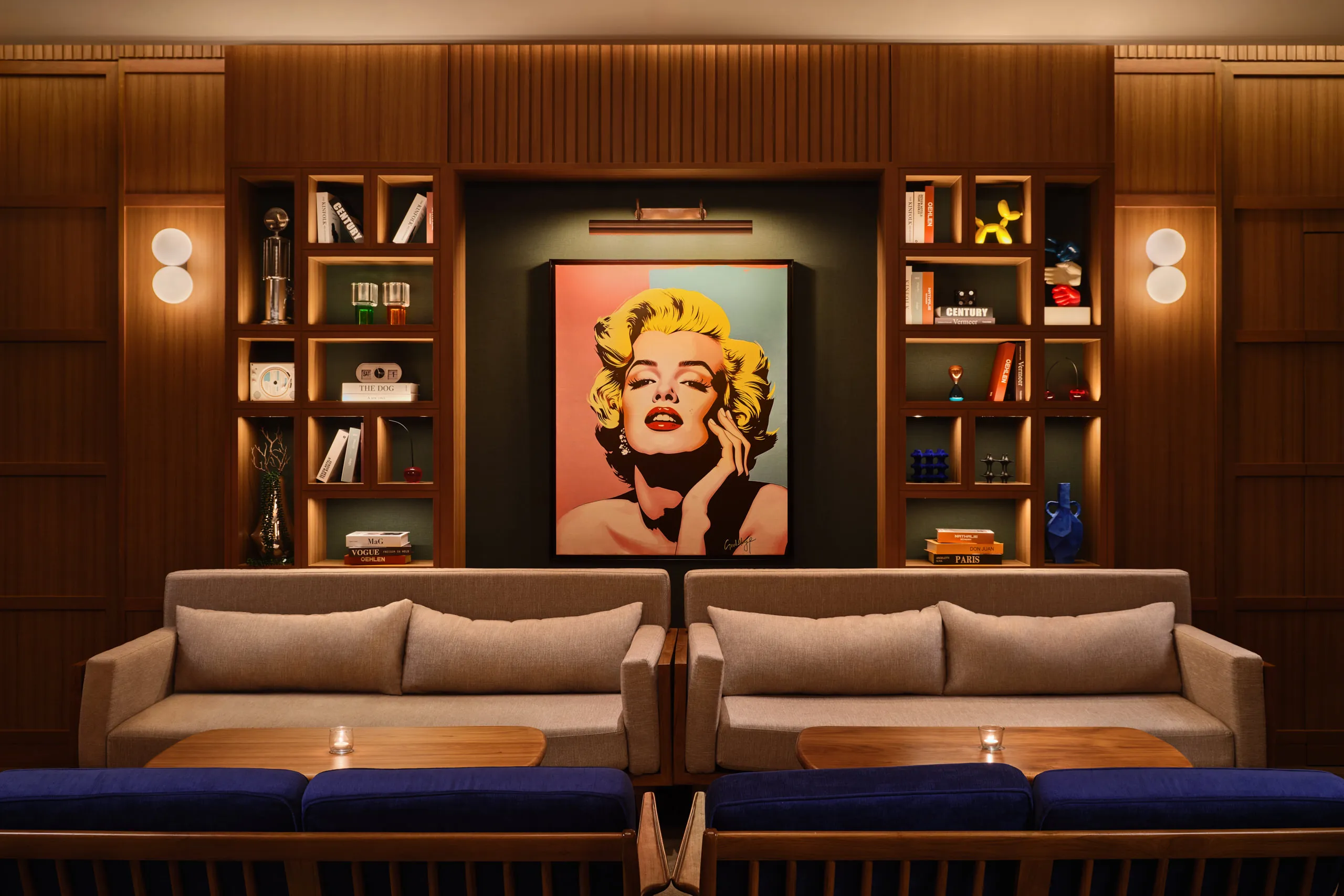 Lounge with sofas and statement art, photographed as part of an interior design shoot at APT 101 by a Singapore-based interior photographer