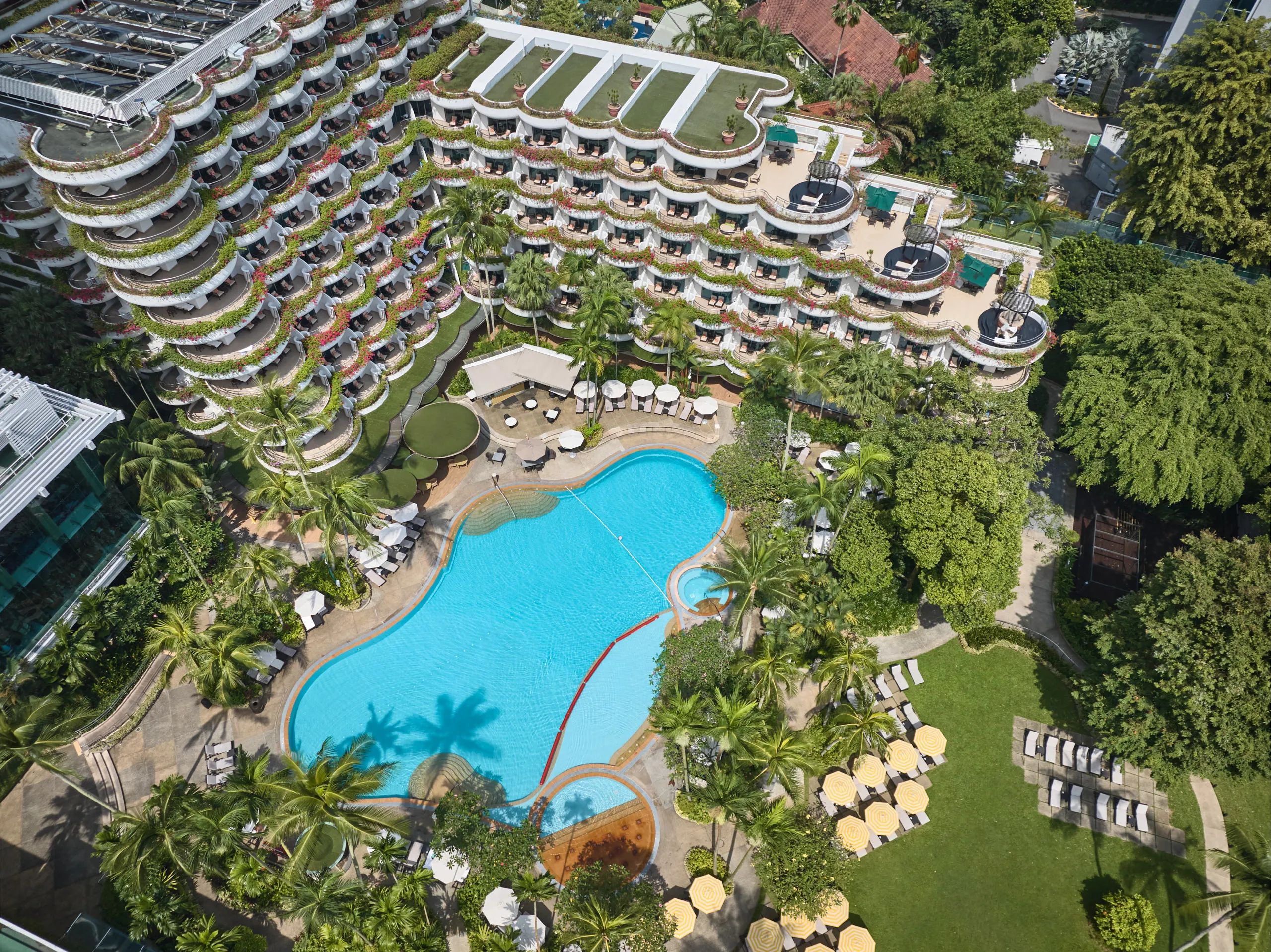 Aerial photograph of Shangri-La Hotel Singapore tropical gardens and resort pool